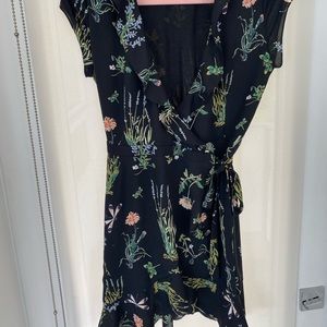 Light and airy wrap dress. Super cute on as a cocktail dress.